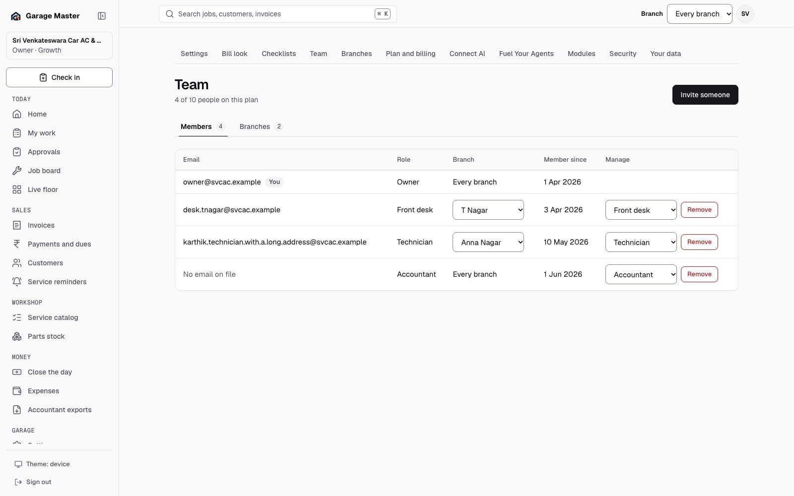 Garage Master team screen with roles and seats, using synthetic records.